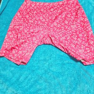 These are XL and Reebok work out shorts. They are a pretty pink and white.